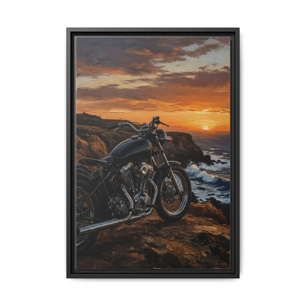 Framed canvas print with black frame showing a motorcycle at sunset over ocean waves