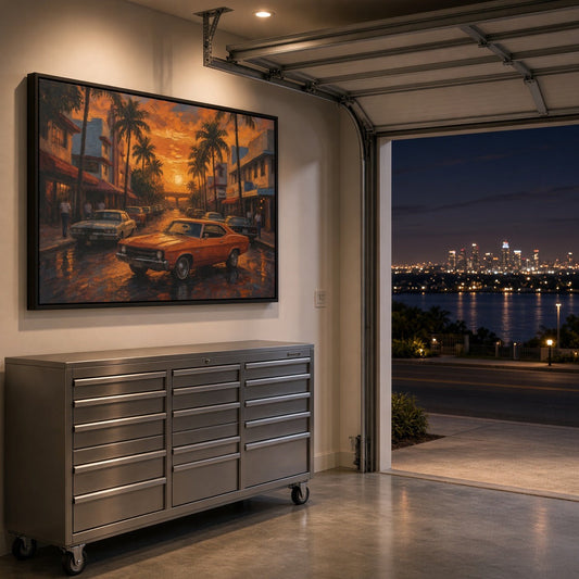 Framed canvas wall art mounted on a wall with orange muscle car sunset street scene