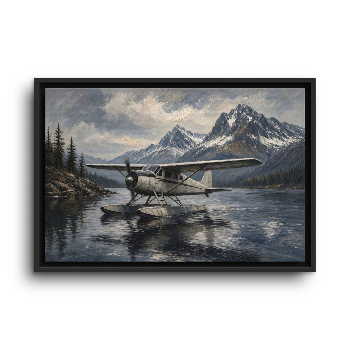 Black-framed canvas print of a seaplane on the lake with pine trees and high mountains