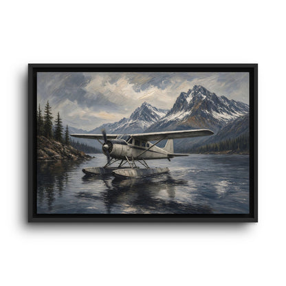 Black-framed canvas print of a seaplane on the lake with pine trees and high mountains