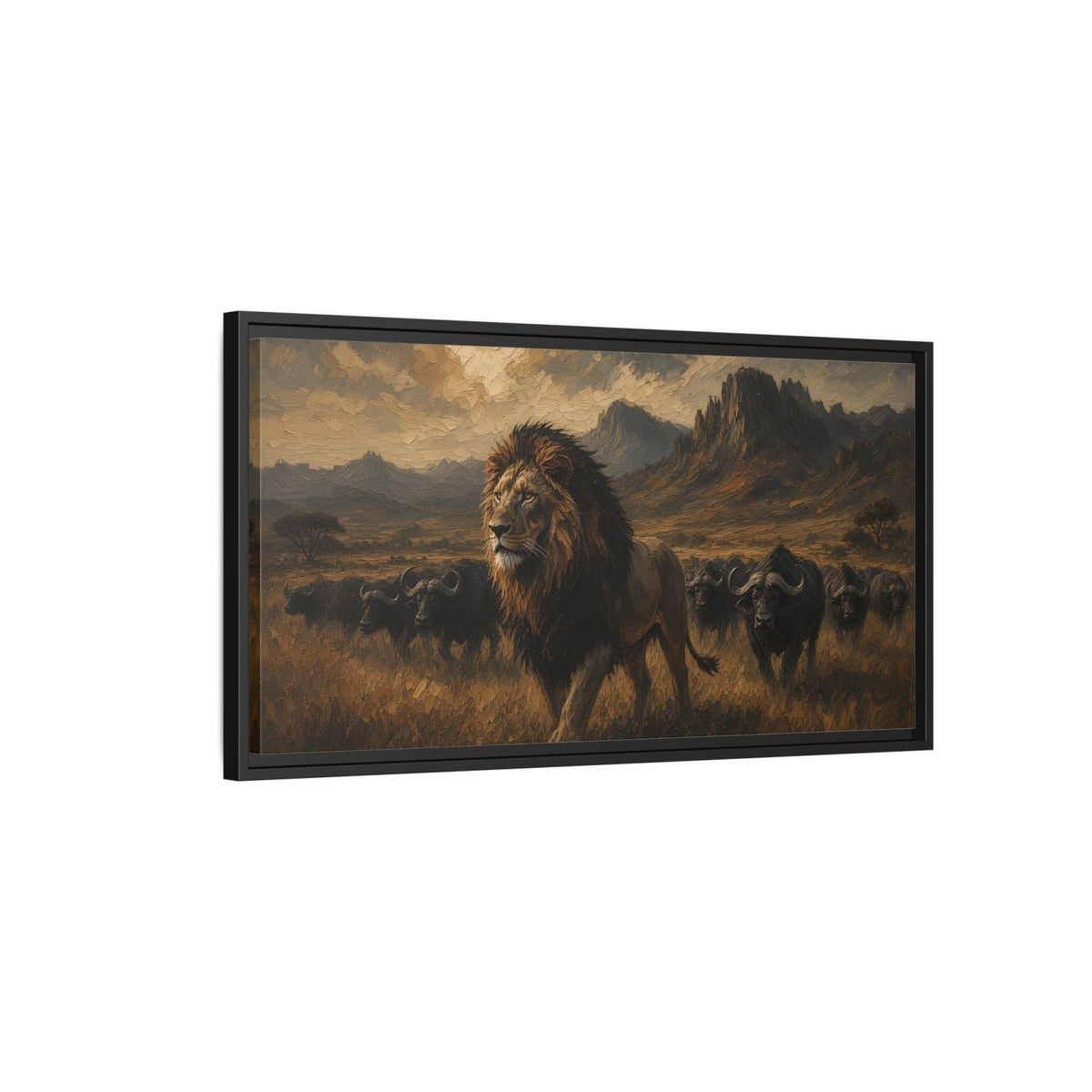 Wide black-framed lion and buffalo canvas landscape with mountains and cloudy sky