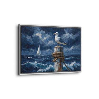 Coastal canvas print in a white frame, shown at an angle, with a gull and sailboat