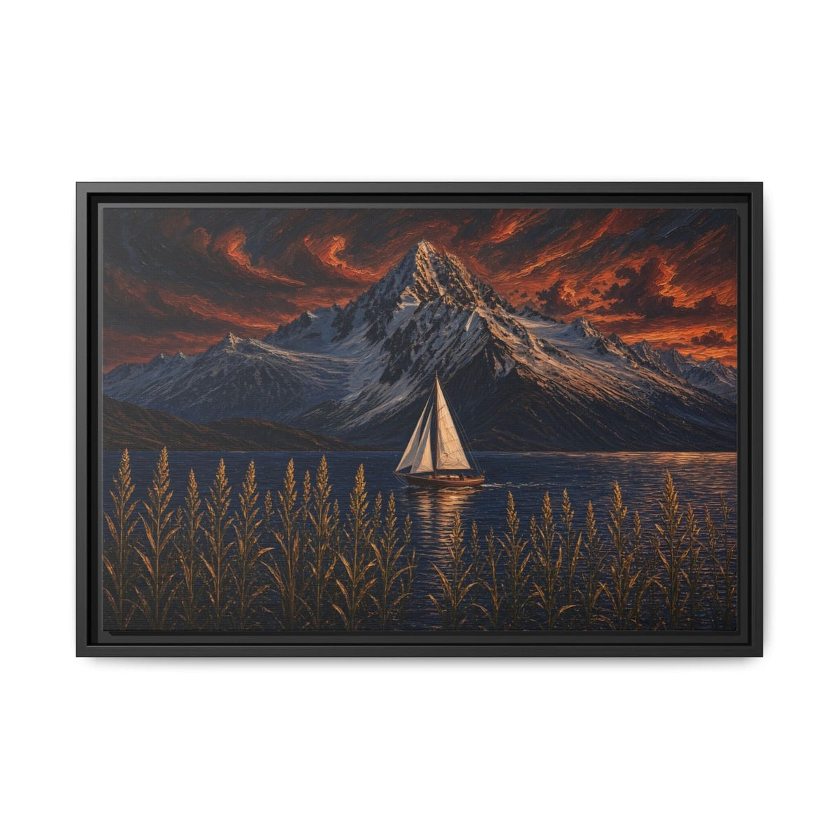 Black-framed wall art with sailboat in calm water, rugged mountain peak, and orange clouds