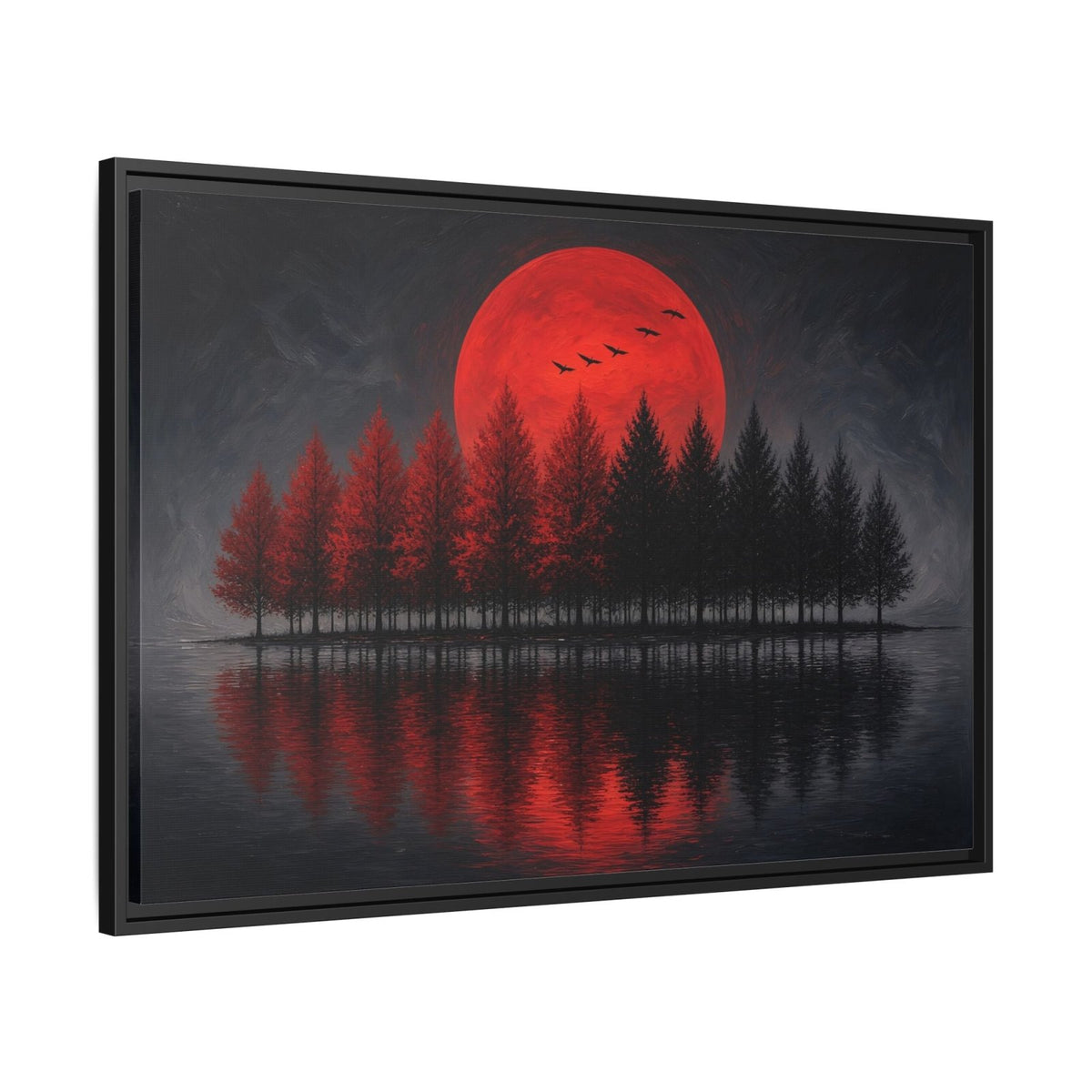 Framed canvas wall art with red moon over forest silhouettes and mirrored lake, black frame side view