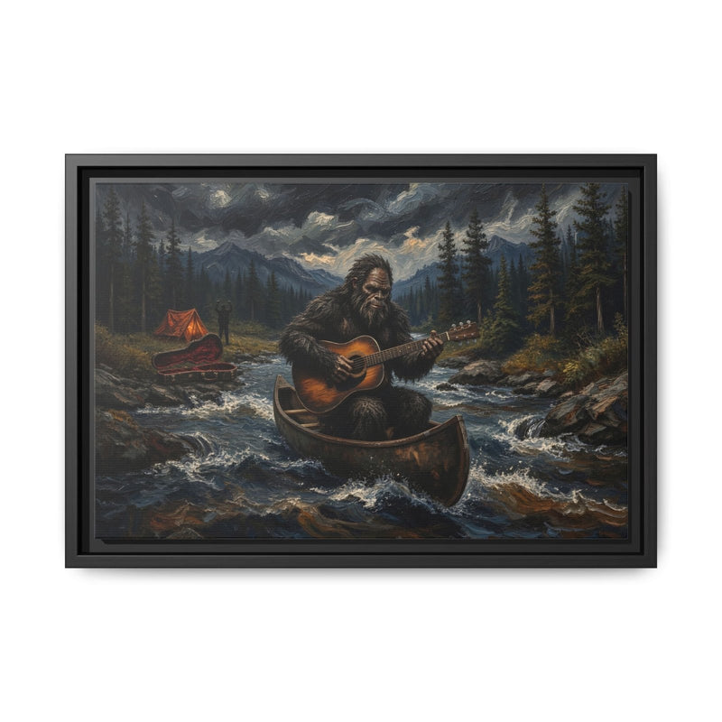 Framed canvas wall art with black border, Bigfoot rowing canoe and strumming guitar in rapids