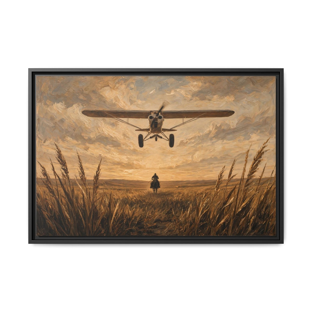 Black-framed canvas wall art: biplane overhead, cowboy in tall grass