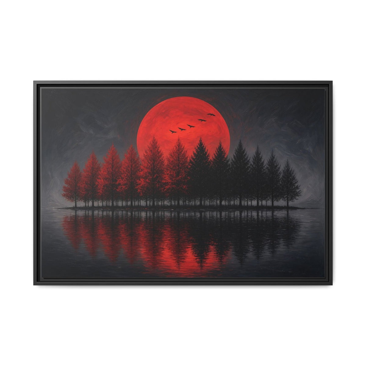Framed canvas wall art showing red full moon above pine trees and reflected lake, black frame