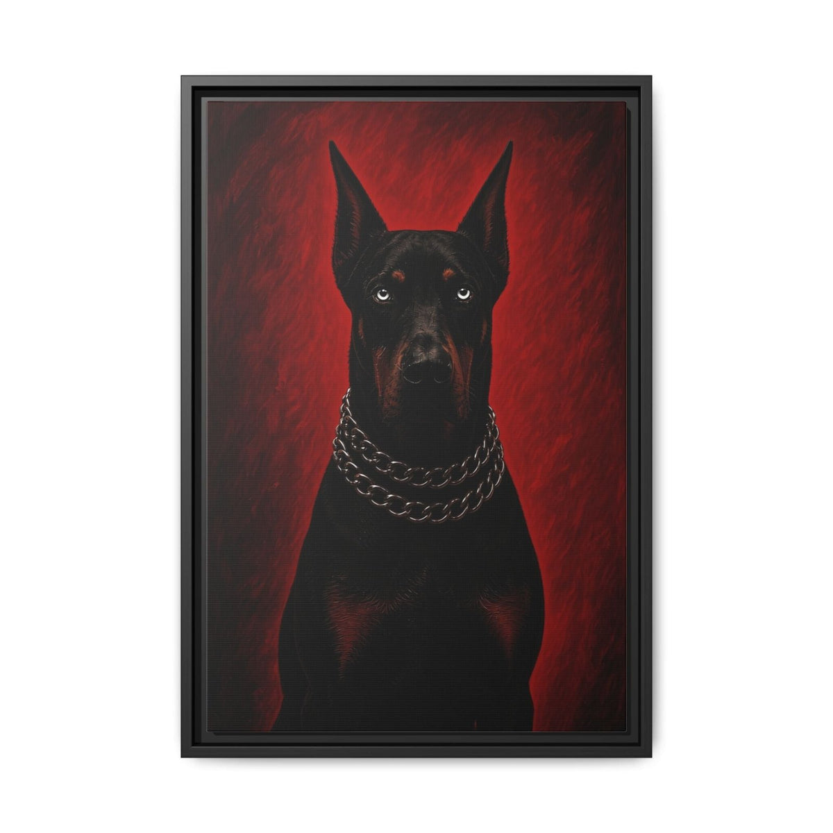 Framed canvas print of a black Doberman with silver chain collar against a red backdrop