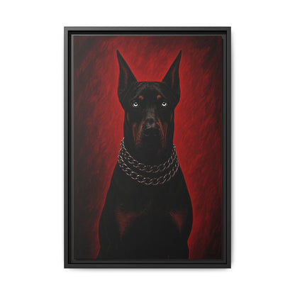 Framed canvas print of a black Doberman with silver chain collar against a red backdrop