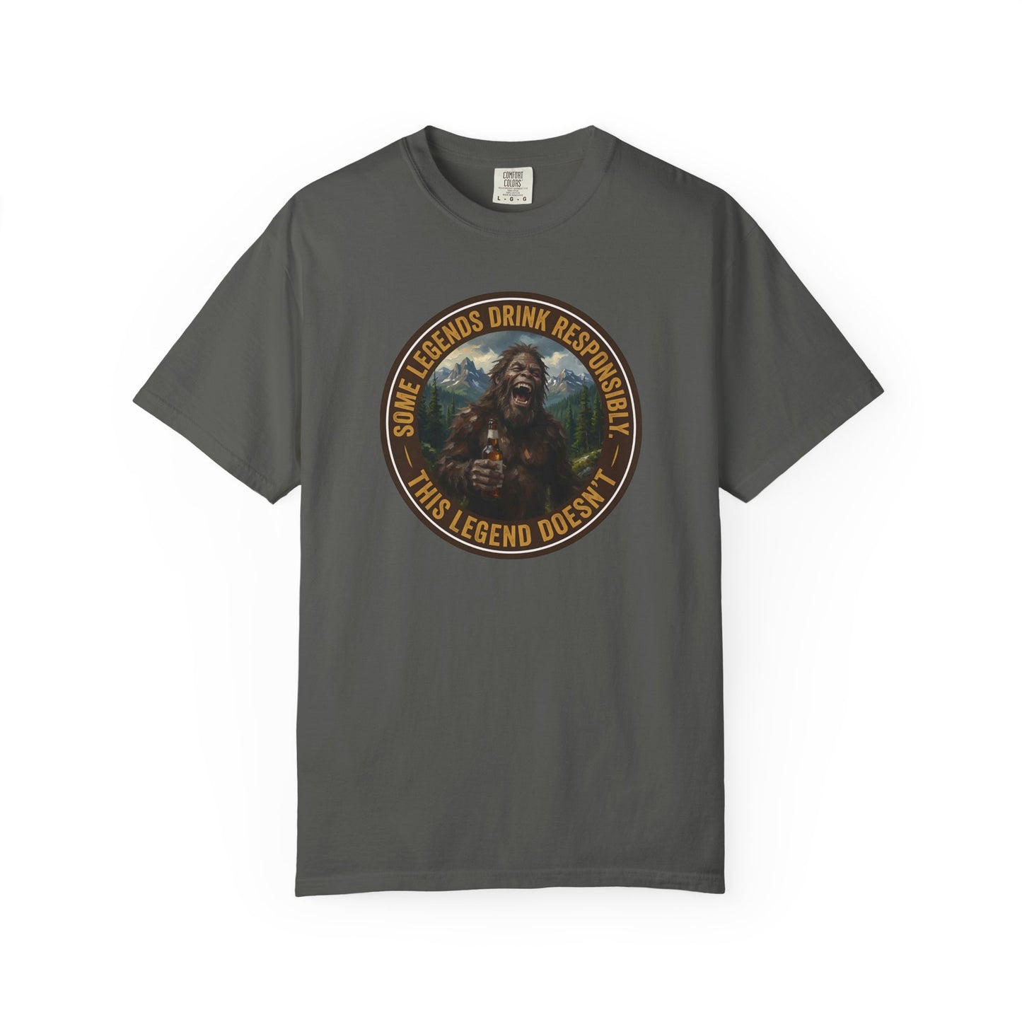 Dark charcoal graphic t-shirt with circular Sasquatch-themed logo on the front