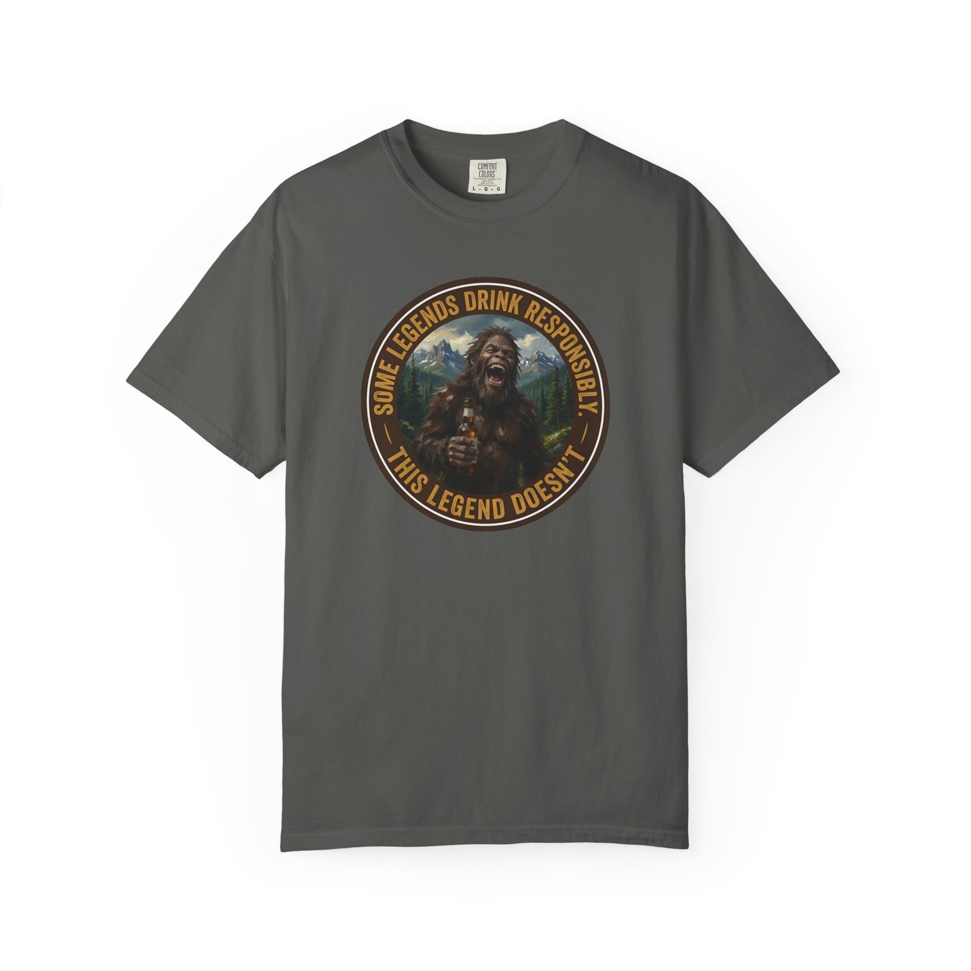 Dark charcoal graphic t-shirt with circular Sasquatch-themed logo on the front