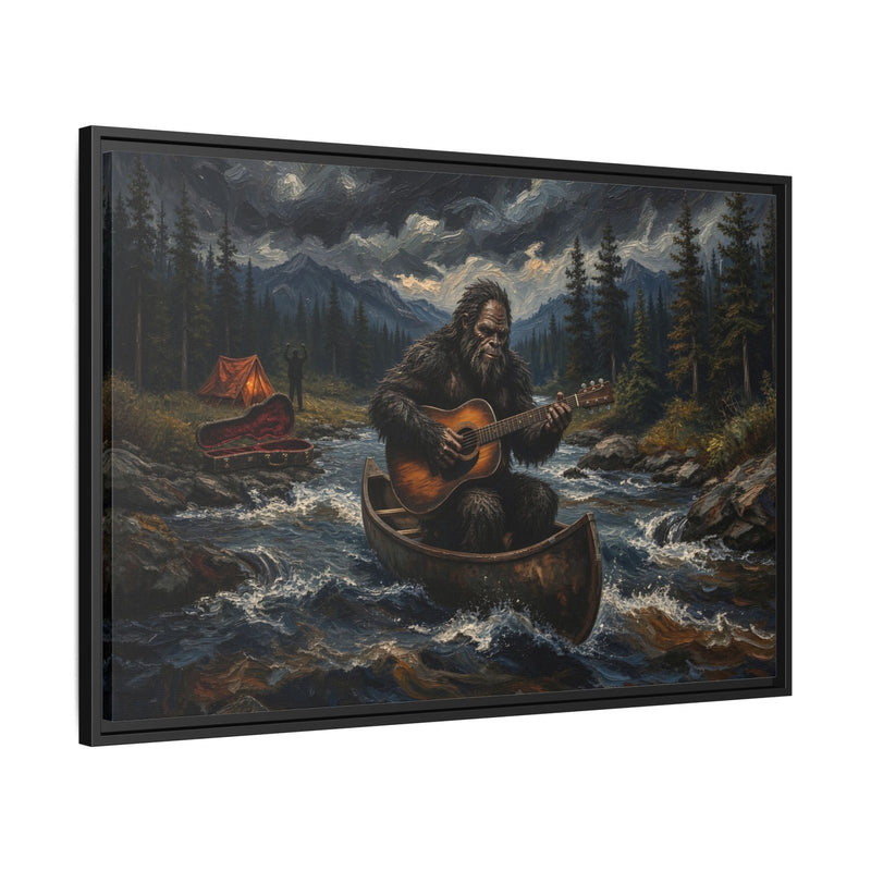 Framed canvas wall art with black frame, Bigfoot paddling canoe and playing guitar amid forest trees