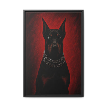 Framed canvas portrait of a black Doberman wearing a silver chain collar, red background