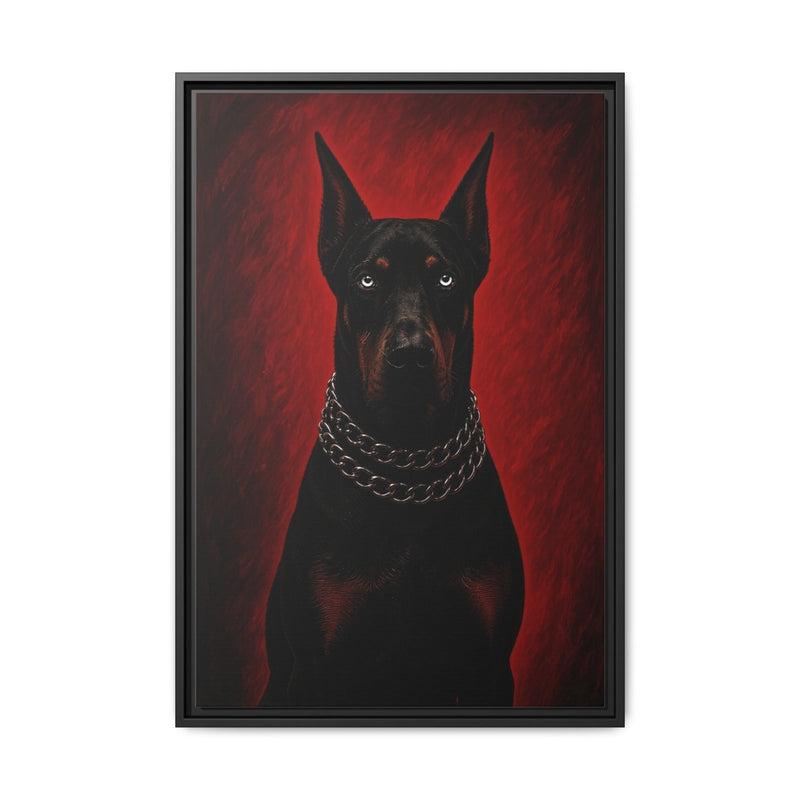 Framed canvas portrait of a black Doberman wearing a silver chain collar, red background
