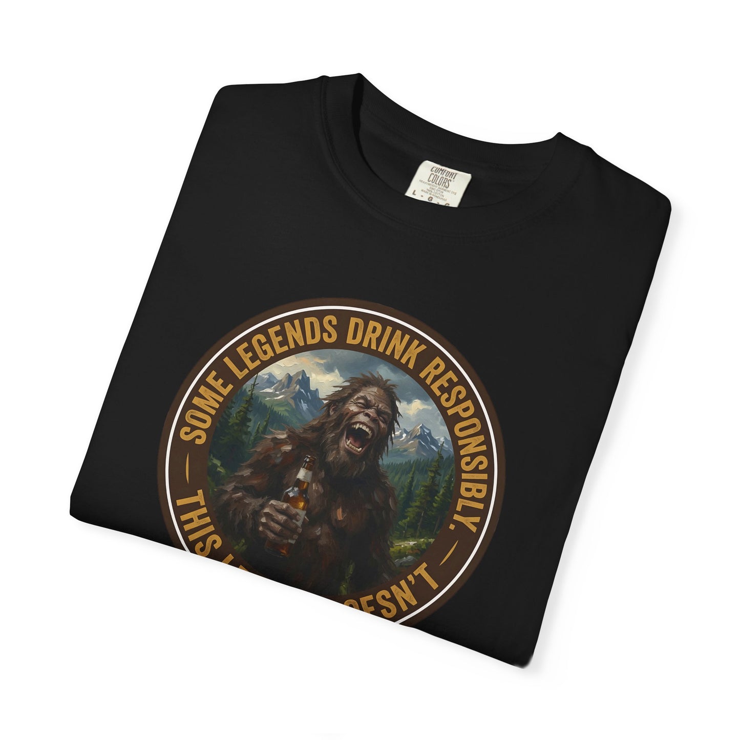 Black graphic T-shirt with circular Sasquatch-style face emblem on chest