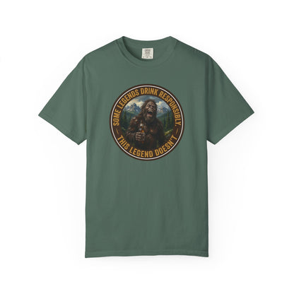 Green graphic t-shirt with circular Sasquatch-themed logo on the front