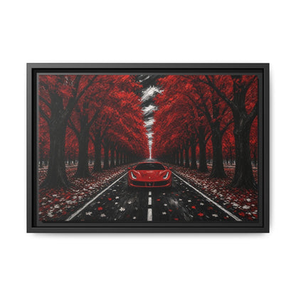 Framed canvas wall art of a red sports car ahead on a leaf-strewn road
