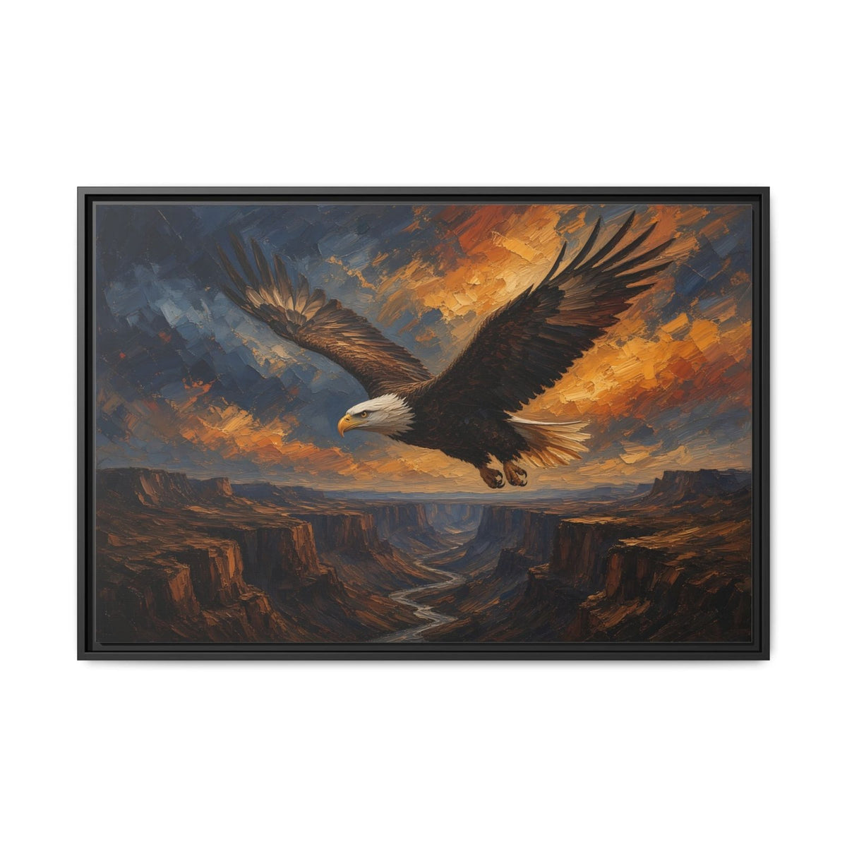 Framed eagle artwork with dark blue and orange sky above rugged canyon cliffs