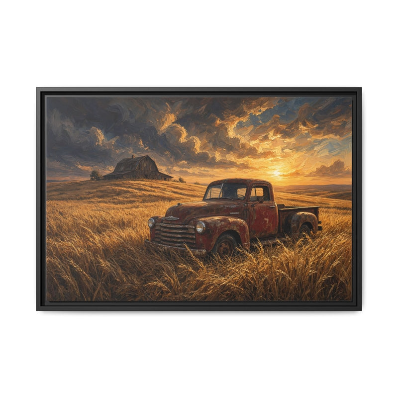 Framed canvas wall art showing a red vintage pickup truck in a golden field at sunset