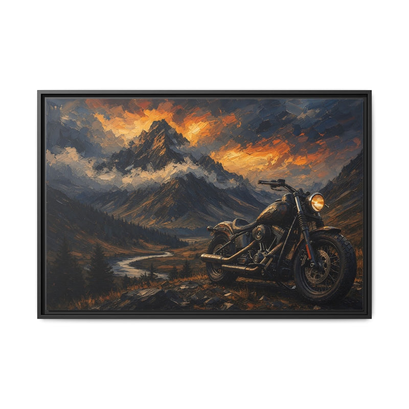 Black framed motorcycle landscape canvas art featuring a road, mountains, and orange sunset