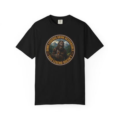 Black graphic t-shirt with circular Sasquatch-themed logo on the front