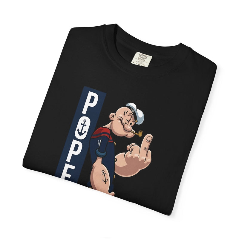Black folded graphic cartoon T-shirt with vertical sailor-themed print at center