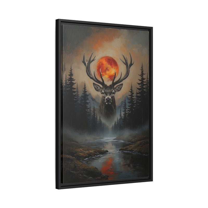 Black framed matte canvas wall art with deer silhouette and fiery orange moon over woods