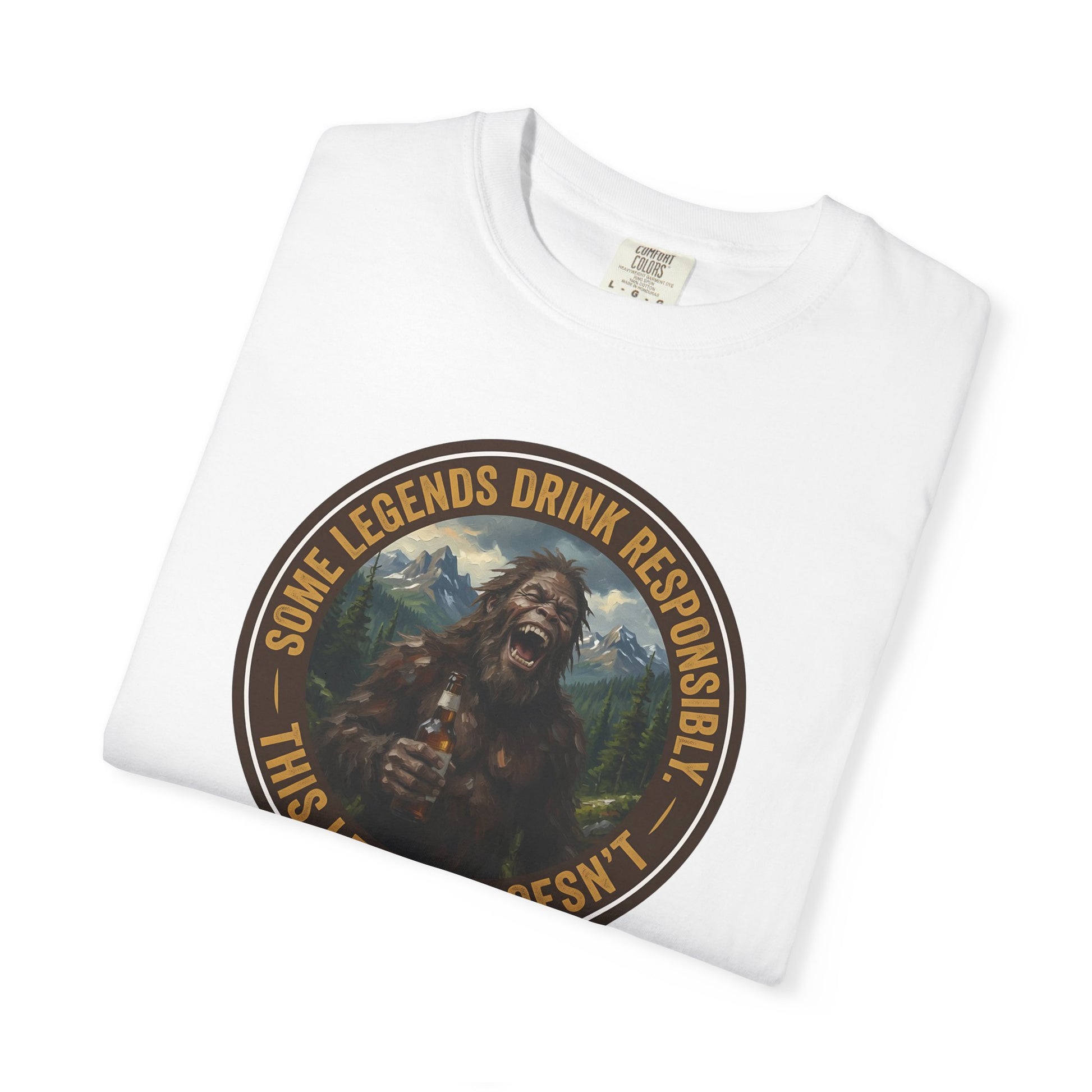 White graphic t-shirt with circular Sasquatch-themed logo on the front, angled