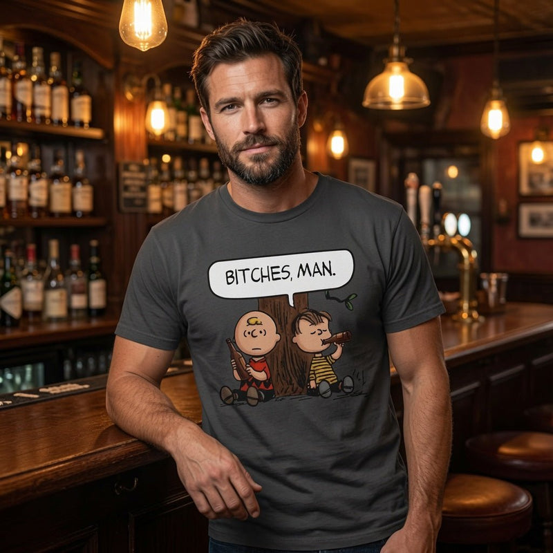 Grey crewneck t-shirt with cartoon characters and “BITCHES, MAN.” chest graphic