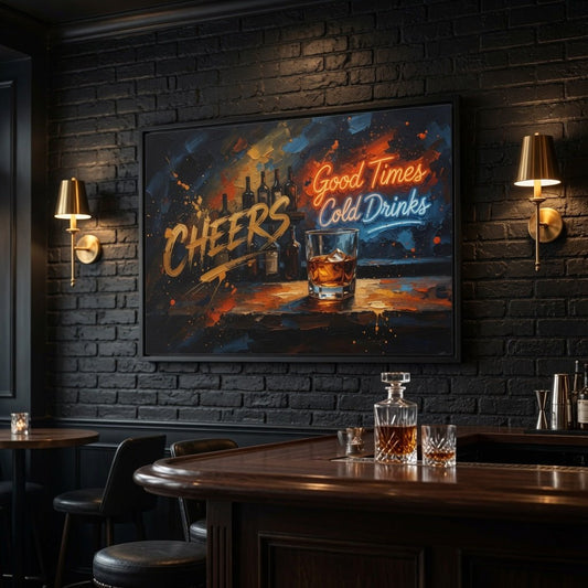 Black-framed wall canvas with 'CHEERS' and whiskey glass under 'Good Times Cold Drinks' text