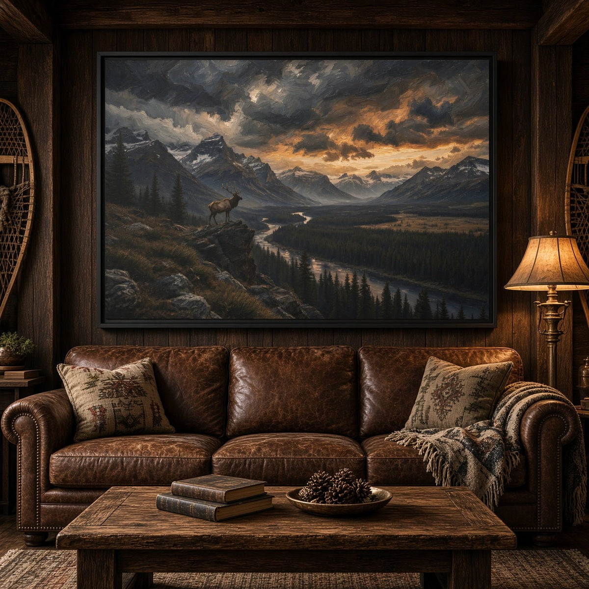 Framed landscape canvas with elk near slope, mountain valley river and sunset sky, black frame