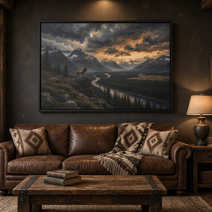 Framed landscape canvas with elk on mountainside and winding river at sunset, black frame