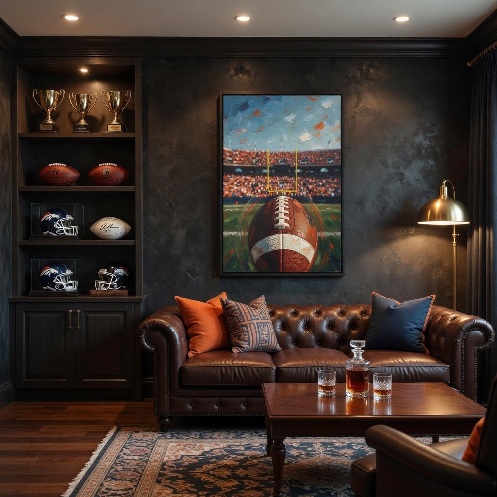 Black-framed canvas wall art with a football centerpiece and glowing stadium lights.