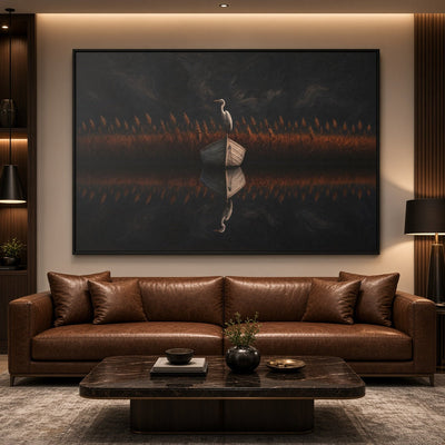 Horizontal framed canvas art of a heron with warm orange grasses in a dark scene.