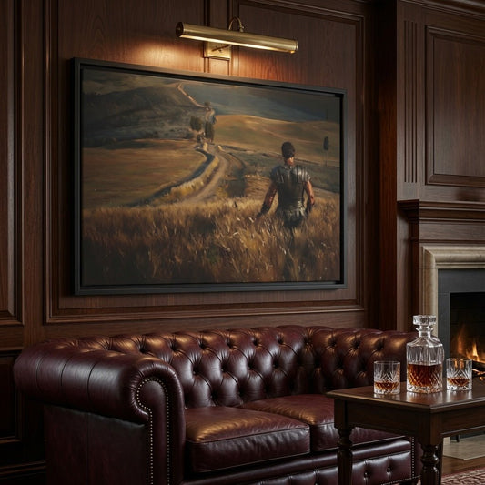 Black-framed matte canvas print on a wall, depicting figures on a winding path in tall grass