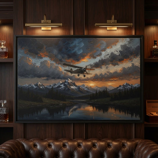 Black-framed framed matte canvas with biplane over mountain lake at sunset