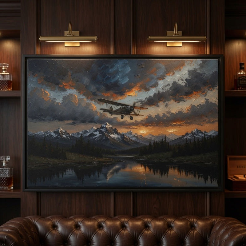 Black-framed framed matte canvas with biplane over mountain lake at sunset
