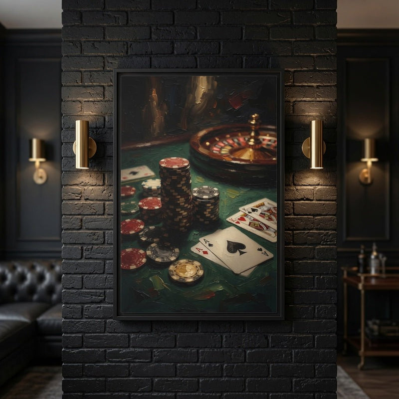 Framed canvas art of poker chips and playing cards with roulette wheel, dark frame on wall