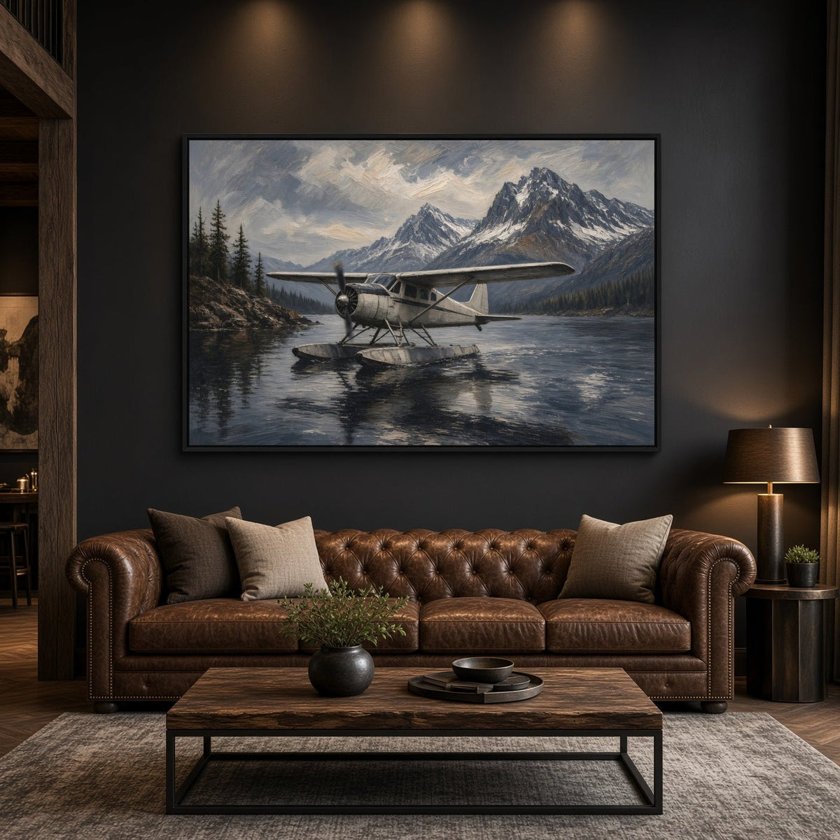 Framed canvas wall art with a seaplane on still water and distant snowy mountains