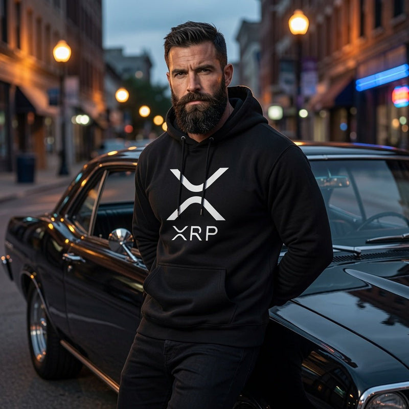Black pullover hoodie with hood and white XRP logo, worn by a man outdoors
